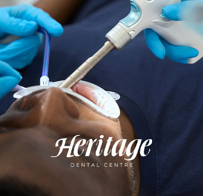 man getting his teeth cleaned at an edmonton dental clinic