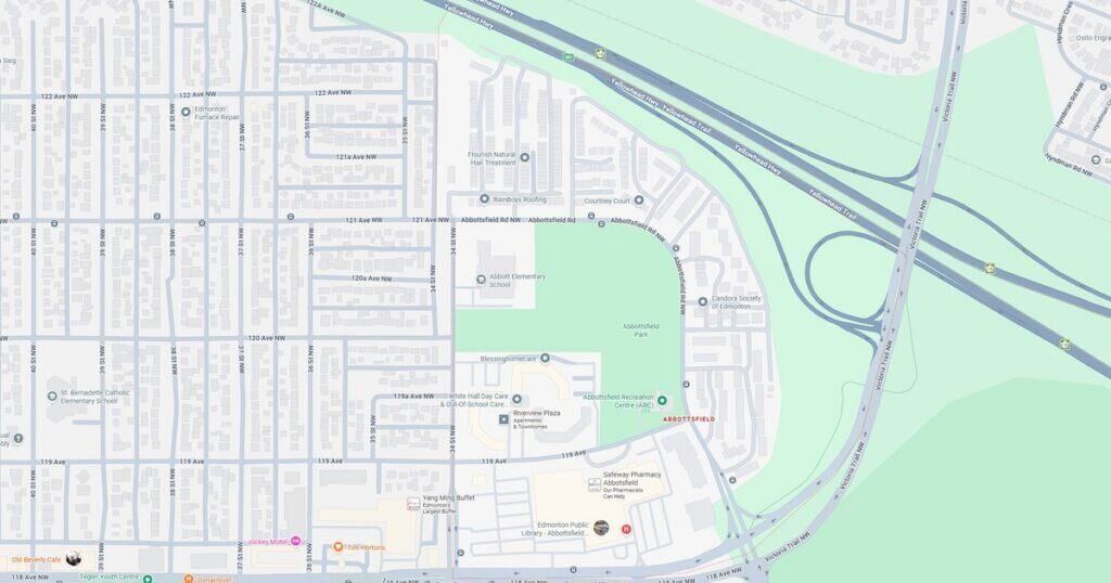 A detailed map of Sunset Park showing streets, green spaces, and nearby highways in a city layout.