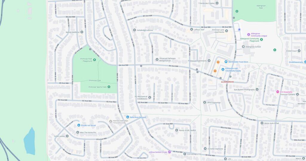 Detailed street map highlighting local roads, green spaces, and community facilities.